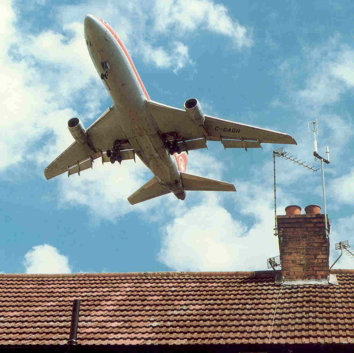 Plane over house